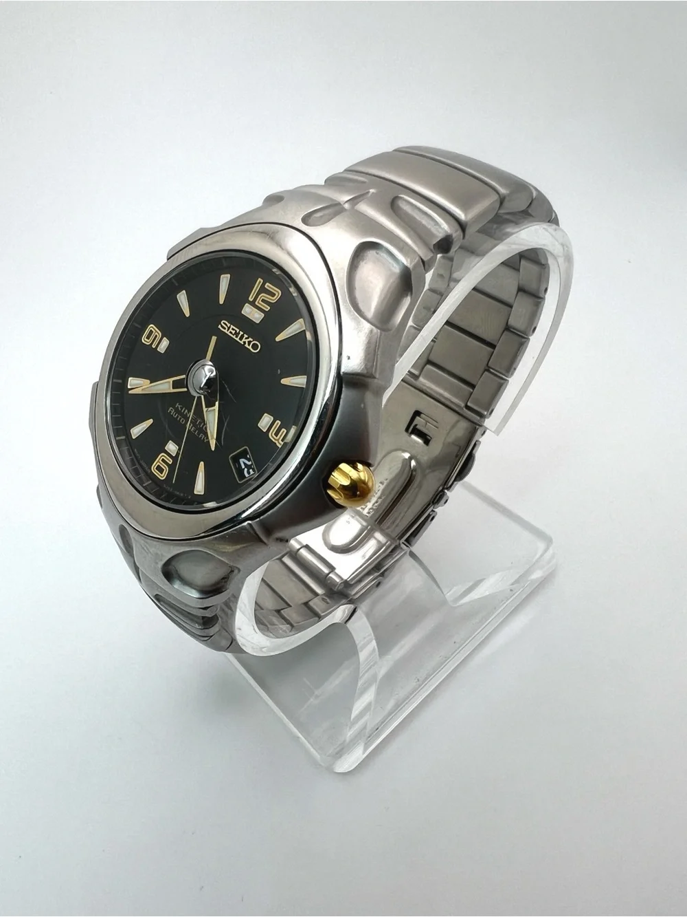 Seiko Kinetic Auto Relay Black Dial Stainless Steel Watch with Gold Accents